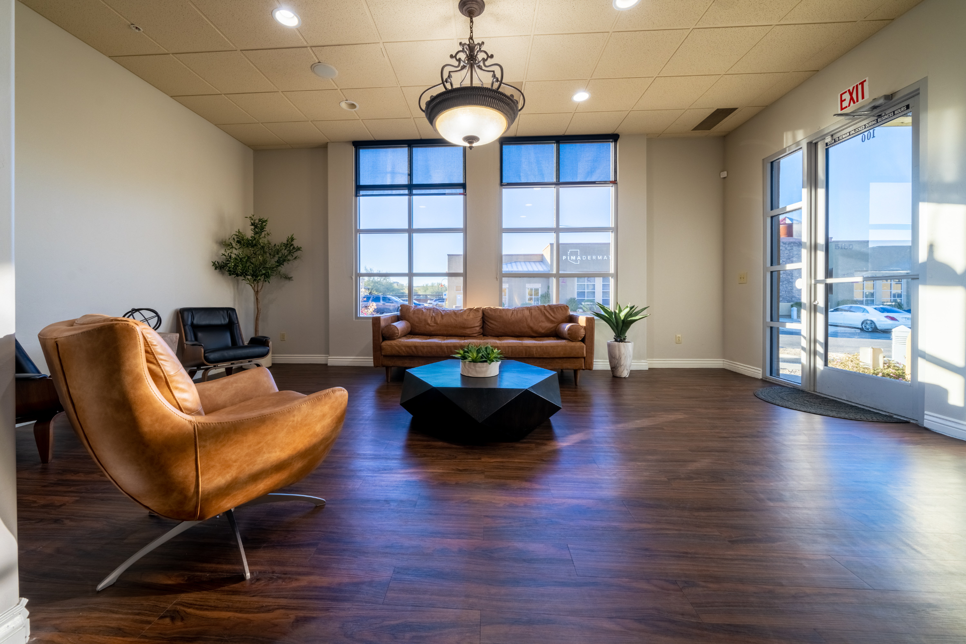 Bright lobby with leather seating and large windows at Desert Mountain Urology